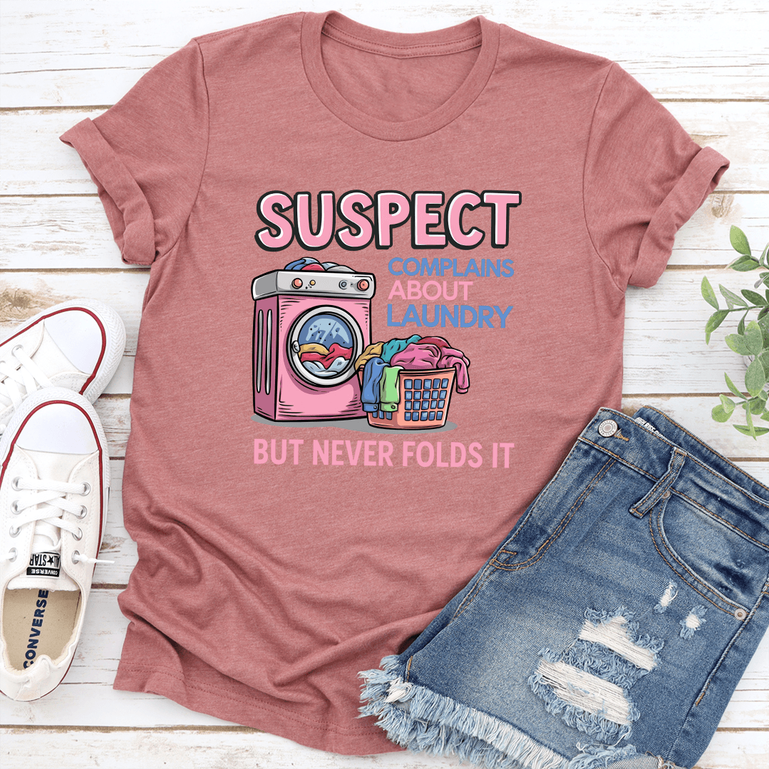 Suspect Complains About Laundry But Never Folds It Tee 1