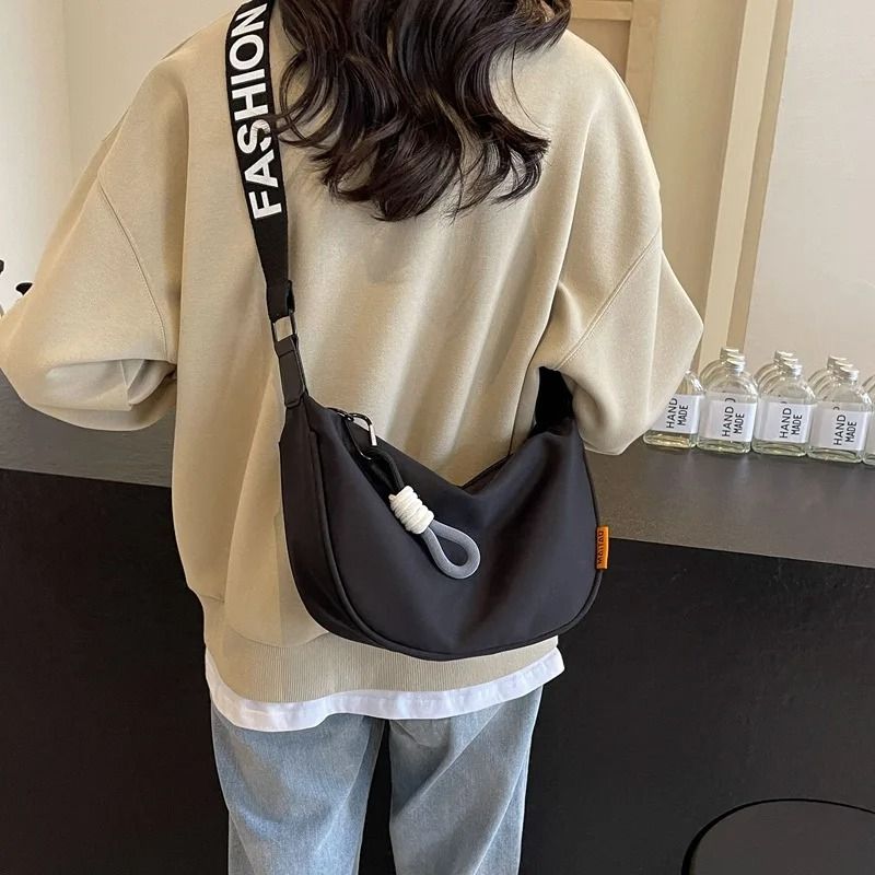 Women Dumpling Crossbody Bag With Wide Shoulder Strap And Zip Closure 2